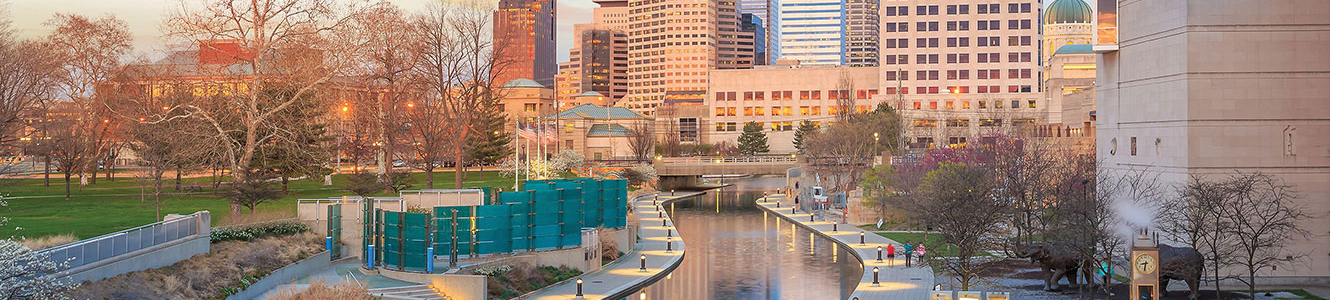 Indianapolis canal with skyline at dusk