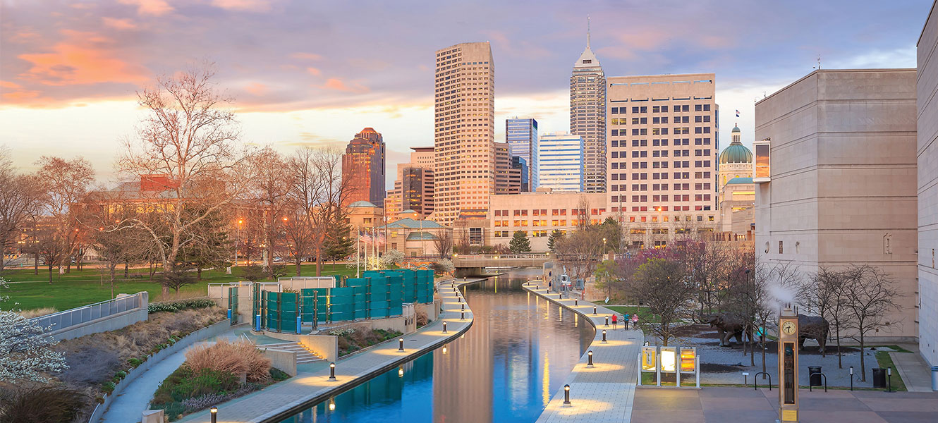 Indianapolis canal with skyline at dusk